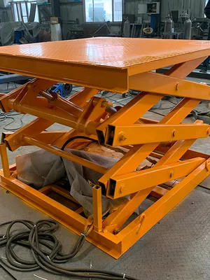 Tilt lift table cargo lift application