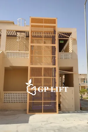 Outdoor beige mesh cargo lift villa & commercial building project