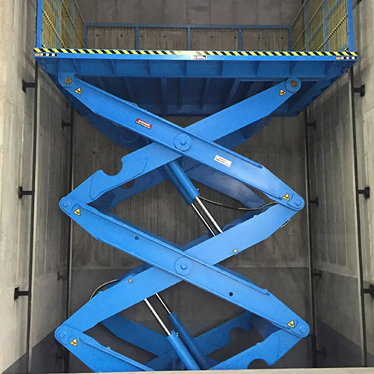 Dock lift platform installed in a pit